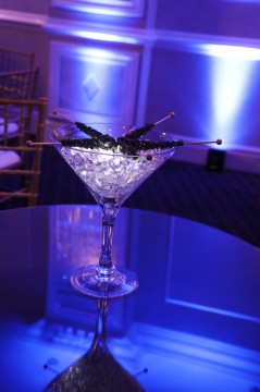 Classic Lounge Centerpiece with Black Rock Candy Over LED Clear Chips in a Martini Glass for Bat Mitzvah High Top Set Up