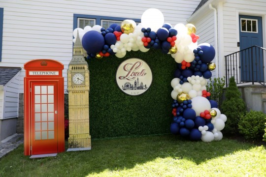 London Theme Cutouts with Organic Balloon Arch and Greenery Wall with Custom Sign for Outdoor Party Decor
