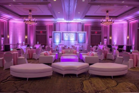 Winter Themed Bat MItzvah Lounge with Custom Decals, Logo Pillows, LED Backdrop & Pink Lighting at the Pearl River Hilton