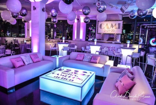 Bat Mitzvah Lounge Setup with Custom LED Tables, Logo Pillows & Glittered Name Backdrop at Tribeca 360, NYC