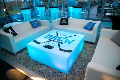 Hockey Themed Lounge with LED Logo Tables & Custom Pillows at Fairview Country Club