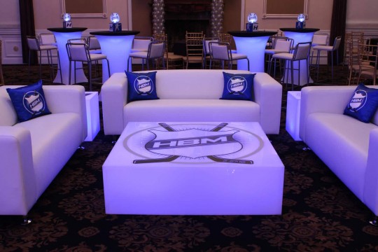 Hockey Themed Lounge with Custom Pillows, Logo Decals & LED Hightops at Florentine Gardens