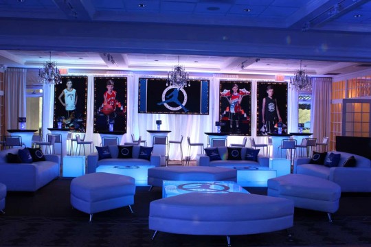 Lounge Setup with LED Backdrop, Blowup Photos, LED Furniture, Custom Pillows, Logo Decals & Mini Centerpieces for Sneaker Themed Bar Mitzvah