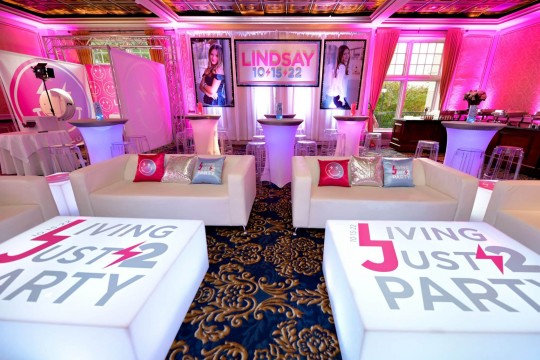 Hot Pink & Light Blue Bat Mitzvah Lounge with Custom Decals on Coffee Tables, Logo Pillows & Glittered Sign with Blowup Photos at VIP Country Club