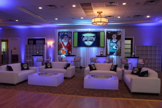 ESPN Themed Bar Mitzvah Lounge with Couches, LED High Tops, Logo Decals, Custom Pillows & Backdrop at Crestmont Country Club