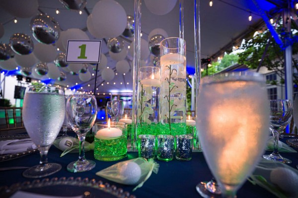 Stunning Orchid Centerpiece with Floating Candles and Chips for Bar Mitzvah