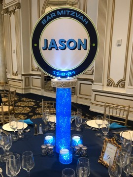 LED Logo Topper Centerpiece with Royal Blue Aqua Gems, Floating Candles and Silver Votives for Bar Mitzvah Decor