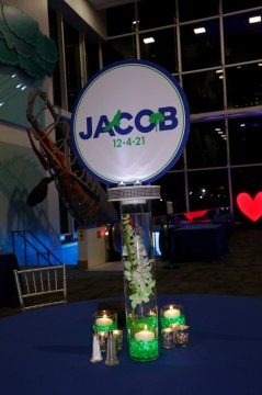 Logo Topper Centerpiece with LED Orchid Cylinders, Silver Votives and Floating Candles