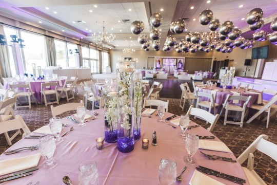 Beautiful Room Decor for Bar Mitzvah with Classic and Stunning Orchid Centerpiece with Purple Chips and Floating Candle and Metallic Silver Orbz Ceiling Treatment