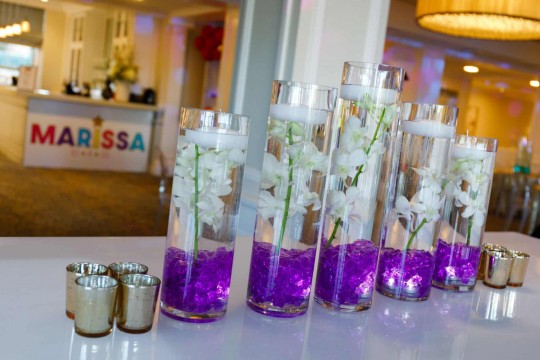 Orchid Centerpiece Cylinders with Purple Chips and Floating Candles
