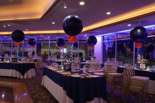 Travel Themed Bar Mitzvah with Navy & Red Balloon Centerpieces and Blue Uplighting at Glen Island Harbour Club, NY