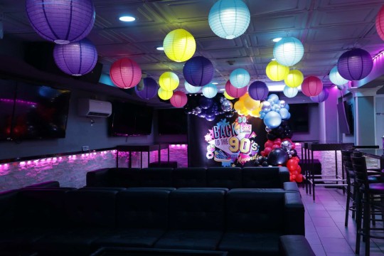 90's Themed Birthday with LED Lanterns on Ceiling and Custom Photo Backdrop