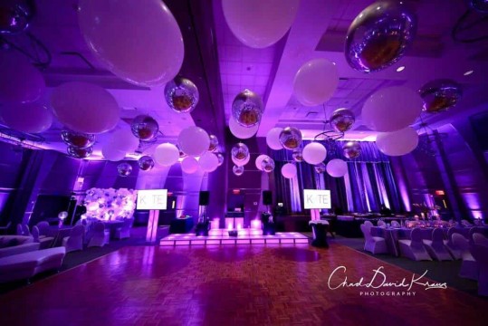 Beautiful Bat Mitzvah Setup with White & Silver Ceiling Balloons & Lavender Uplighting at Kol Ami, White Plains