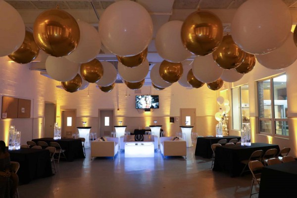 Gold & White Quinceanera with White & Gold Ceiling Balloons, Custom LED Lounge & Gold Uplighting