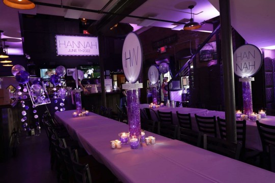 Purple & Lavender Bat Mitzvah with Custom Logo Centerpieces, Glittered Backdrop & LED Lighting at Hudson Social