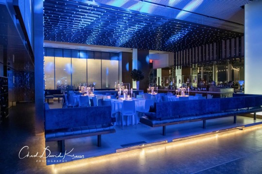 Blue Bar Mitzvah Room with Candle Centerpieces at Riverpark, NYC