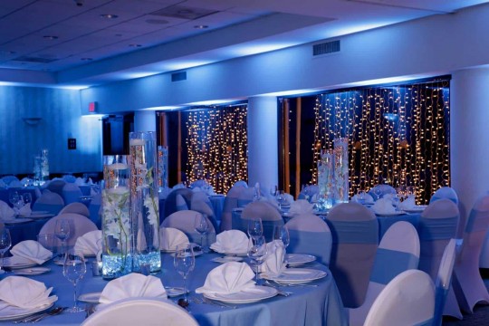 Pale Blue Bat Mitzvah Setup with LED Orchid Centerpieces, Twinkle Lights in Windows and LED Uplighting at Doral Arrowwood Resort