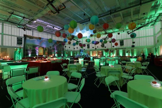 Emerald City Room Setup with Hot Air Balloons & Cloud Sculptures on Ceiling, Wall Mural & LED Lighting at Solomon Schechter Upper School