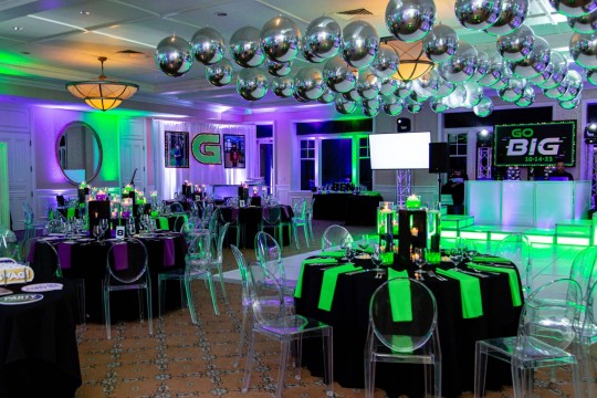 Neon Themed Bar Mitzvah with Silver Balloons over Dance Floor, LED Cinder Block Centerpieces, Blowup Photo & Initial Behind Bar and LED Uplighting  at Tamarack Country Club