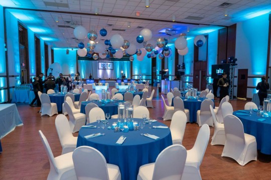 Blue Bat Mitzvah Party Room with Ceiling Balloon Treatment, LED Centerpieces and Custom Lounge at Temple Israel Center, White Plains