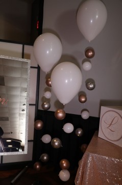 Balloon Bubble Strands as Accent Decor Near Sign in Board and Gift Box  for Sweet Sixteen