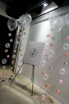Bubble Balloon Strands as Accent Piece near Sign in Board