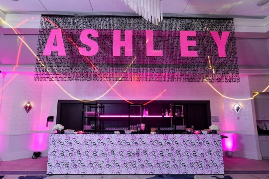 Glittered Name Display on Black Beaded Draping behind Bar at Montammy Country Club