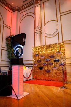 Gold Bling Photo Backdrop with Fan Display and Hanging Lights for Opera Themed Sweet Sixteen