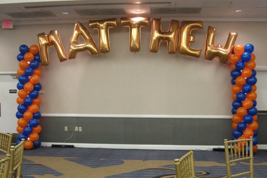 Gold Mylar Name in Balloons with Balloon Columns