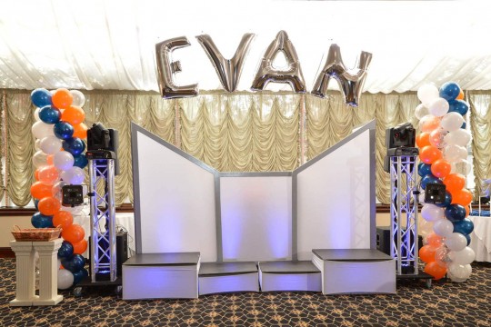 Mylar Name in Balloons Arch with Orange & Navy Balloon Columns