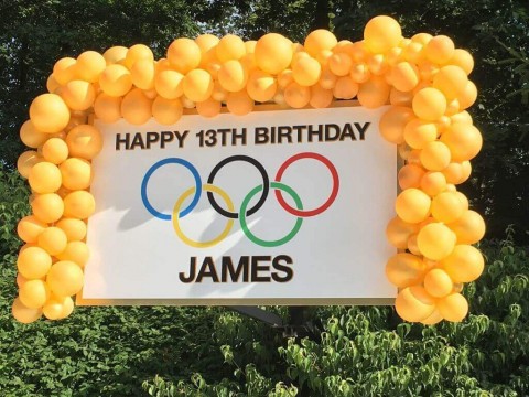 Olympic Themed Sign with Balloon Garland Border
