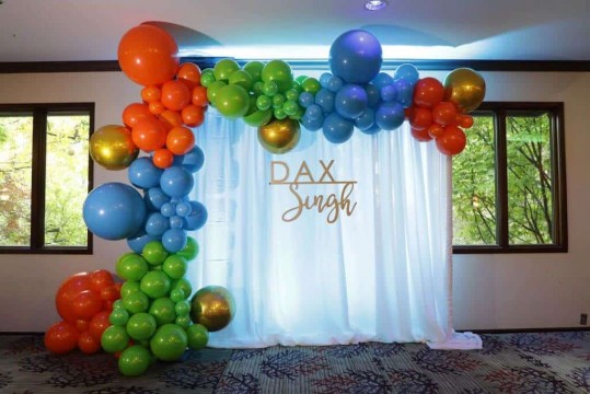 Organic Balloon Arch with Metallic Orbs & Pipe & Drape Background