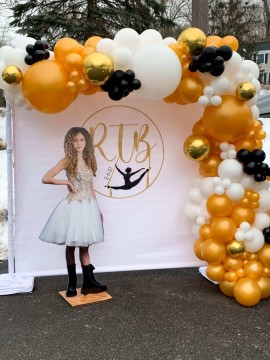 Organic Balloon Arch Over Custom Vinyl Backdrop and with Life Size Cut Out for Outdoor Drive By Event Decor