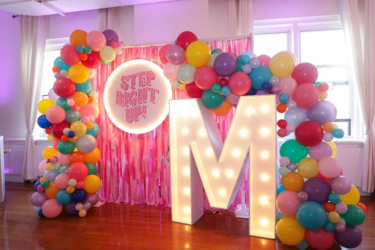 Carnival Themed Balloon Garland with Custom Tassel Backdrop & LED Marquee Letter for Bat Mitzvah Photo Booth