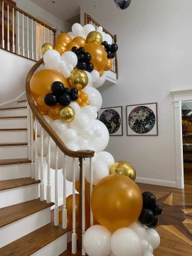Organic Balloon Garland Over Stairway for House Party Decor