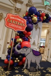 Vintage Carnival Themed Signage with Balloon Garland for First Birthday