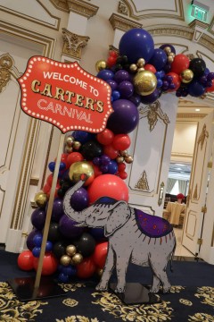 Vintage Carnival Themed Signage with Balloon Garland for First Birthday