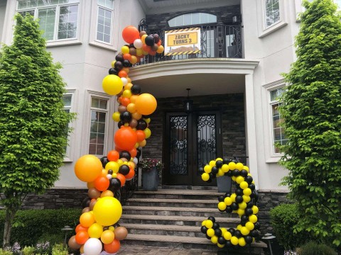 Construction Themed Organic Balloon Arch Over Entryway & Stairway for Outdoor Birthday Decor