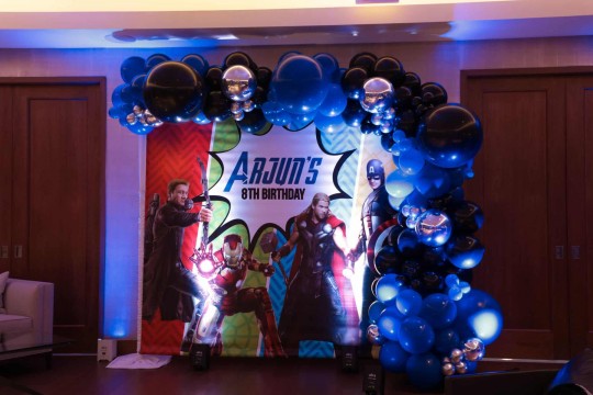 Superhero Themed Photo Backdrop with Black & Blue Balloon Garland for Kids Birthday