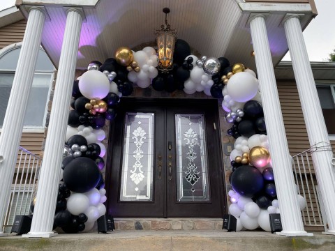 Black & White Organic Balloon Garland over House Entrance