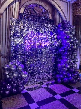 Purple & Silver Metallic Balloon Garland with Silver Shimmer Wall and Neon Sign for Bat Mitzvah Photo Booth