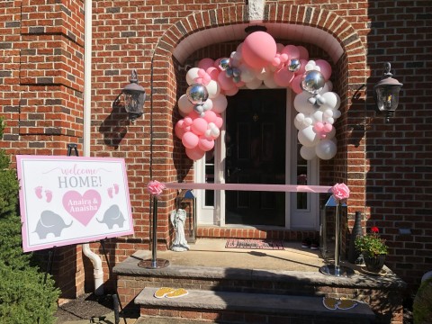 Entrance Organic Balloon Garland with Custom Sign and Ribbon Welcoming Newborns Home