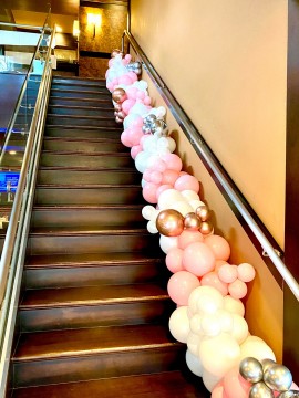 Organic Balloon Garland Over Stairway for Rehearsal Dinner Entrance Decor