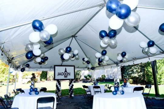 Ceiling Balloon Clusters over Outdoor Tent for Bar Mitzvah Celebration