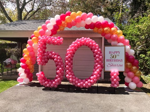 50th Balloon Arch with Sculpture Numbers & Custom Sign