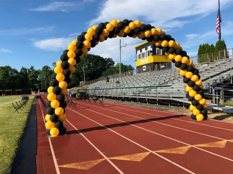 Black & Yellow Balloon Arch for Outdoor Graduation
