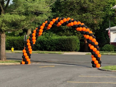 Orange & Black Balloon Arch for Drive By Graduation
