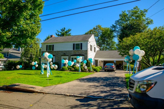 Balloon Clusters Around Driveway, Free Standing Balloons Over Front Yard and Custom Sign for Outdoor Home Party Decor