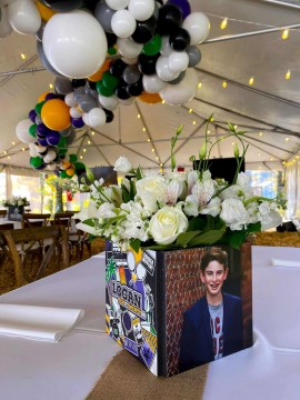 Photo & Logo Cubes with Florals for Rustic Bar Mitzvah in Outdoor Tent