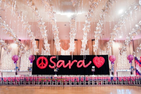 Hot Pink Name in Balloons with Peace Sign & Heart Sculpture on Curtain Backdrop